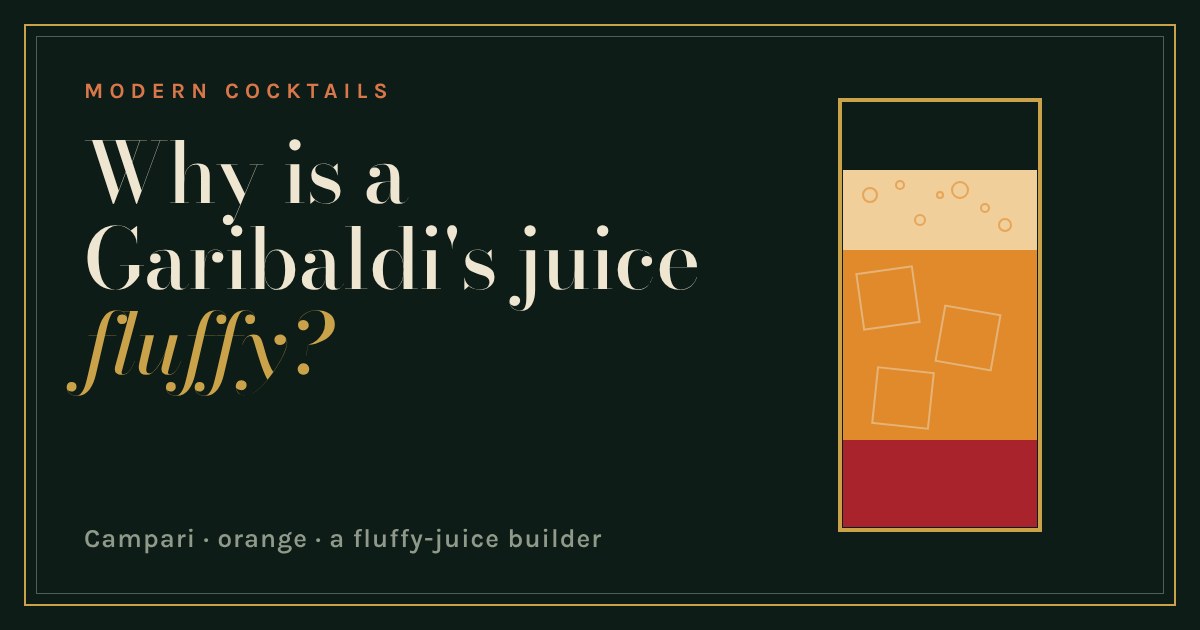 A highball glass with a red Campari layer, orange juice and a pale foam cloud on top