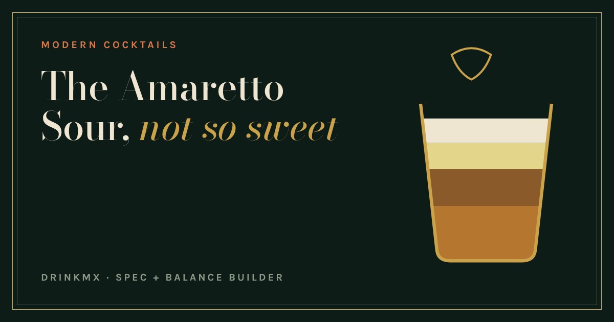 A rocks glass of Amaretto Sour in layers of amaretto, bourbon, lemon and white foam, with a lemon twist above
